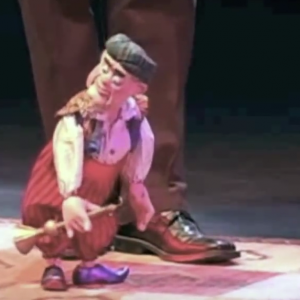 This is a live performance of the "Snake Charmer" from The FRISCH MARIONETTE Company's "Variety Show".