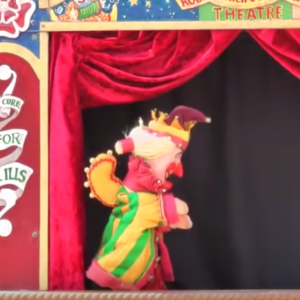 Rod Burnett performing his international Punch and Judy Show at Mr Punch's 350th Birthday Celebration in Lincoln July 2012